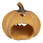 Achterkant van oranje keramieken Halloween pompoen met opening