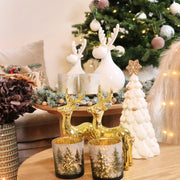 Witte decoratieve kerstboom met gouden accenten