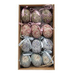 Een houten doosje gevuld met twaalf verschillende vintage paaseieren met bloemenprints als kant en klaar paasdecoratie pakket