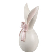 Zijaanzicht van een keramiek look decoratie object met konijnenoren als luxe lente accessoire