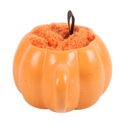 Oranje pompoenvormige mok met handvat en fluffy sokken