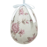 Extra groot wit hangend paasei met een sierlijke roze rozenprint en een lichtblauw satijnen strikje