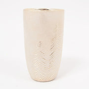 Gouden wintervaas met dennenmotief