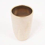 Gouden wintervaas met dennenmotief