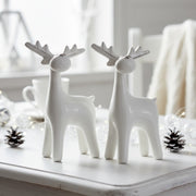 Set van 2 witte keramieken rendieren