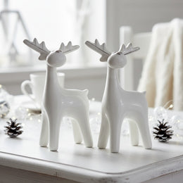 Set van 2 witte keramieken rendieren