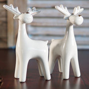 Set van 2 witte keramieken rendieren