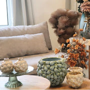 Vaasje of kaarshouder met rond reliëf – Green Oase